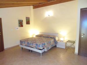 Postel nebo postele na pokoji v ubytování B & B AECOLIBRIUM + 31 fotografií