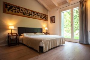 Posteľ alebo postele v izbe v ubytovaní Agriturismo Sommavalle