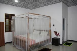 Postel nebo postele na pokoji v ubytování Calm Garden Cabanas