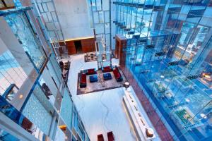 an overhead view of a pool in a building at Taj City Centre Gurugram in Gurgaon