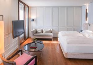 Postel nebo postele na pokoji v ubytování CoolRooms Palacio Villapanés 5 GL