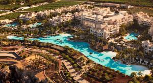 an aerial view of the pool at the resort at Gran Melia Palacio de Isora Resort & Spa in Alcalá