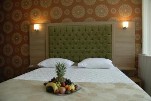 Кровать или кровати в номере Lounge Hotel