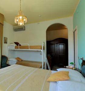 Postel nebo postele na pokoji v ubytování Hotel La Margherita & SPA