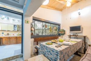 TV/trung tâm giải trí tại Villa Emilia