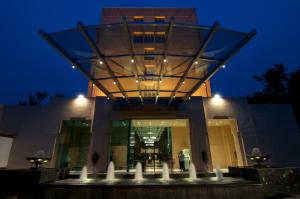 a building with a water fountain in front of it at Blue Diamond Pune IHCL SeleQtions in Pune