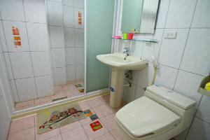 Koupelna v ubytování Shang Her Yuan B&B + 12 fotografií