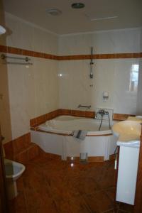Koupelna v ubytování Petit Palais Hotel