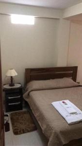 Cama o camas de una habitación en Hostal Jem