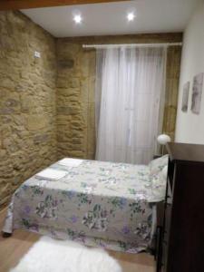 Postel nebo postele na pokoji v ubytování APARTAMENTO NUEVO EN CENTRO HISTORICO A CORUÑA