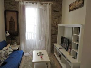 TV a/nebo společenská místnost v ubytování APARTAMENTO NUEVO EN CENTRO HISTORICO A CORUÑA