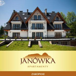 ein Bild eines Hauses mit den Worten Jamovaarmaarma in der Unterkunft Janówka Apartamenty in Kościelisko