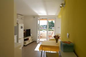 TV a/nebo společenská místnost v ubytování Apartment Marija