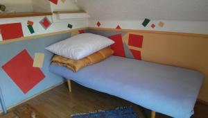 A bed or beds in a room at chata Ivka Leštiny
