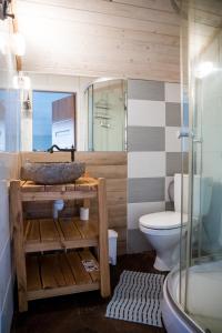 a bathroom with a sink and a toilet at Pape Rogas in Pape