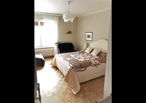 Postel nebo postele na pokoji v ubytování Apartment Rue Centrale
