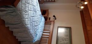 Postel nebo postele na pokoji v ubytování Casa Rural Tío Carlillos