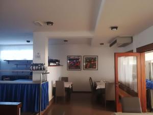 Postel nebo postele na pokoji v ubytování Hotel Ambra
