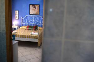 Postel nebo postele na pokoji v ubytování B&B Miroca