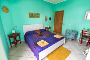 Postel nebo postele na pokoji v ubytování B&B Miroca