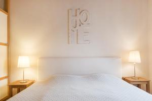 Postel nebo postele na pokoji v ubytování Sunny Apartments Vienna