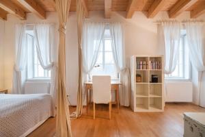 Postel nebo postele na pokoji v ubytování Sunny Apartments Vienna