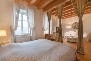 Postel nebo postele na pokoji v ubytování Sunny Apartments Vienna