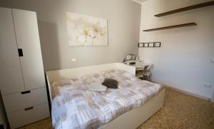 Ένα ή περισσότερα κρεβάτια σε δωμάτιο στο A casa di Simone a Viareggio