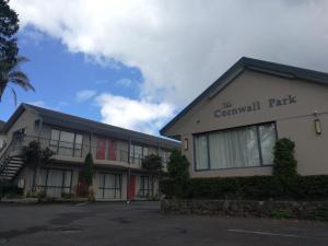 a building with the covenant park written on it at Cornwall Park Motor Inn in Auckland