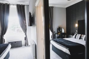 Voodi või voodid majutusasutuse Chapel Cross Guesthouse toas