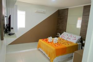Postel nebo postele na pokoji v ubytování Hotel Encantos de Penedo Alagoas