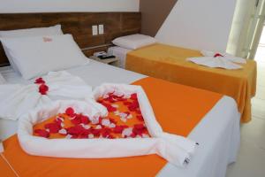 Postel nebo postele na pokoji v ubytování Hotel Encantos de Penedo Alagoas