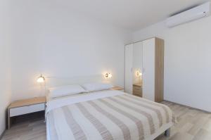 Postel nebo postele na pokoji v ubytování Apartments New home