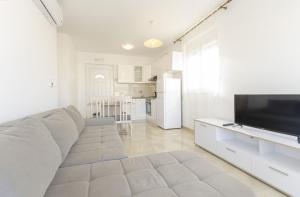 Kuchyň nebo kuchyňský kout v ubytování Apartments New home