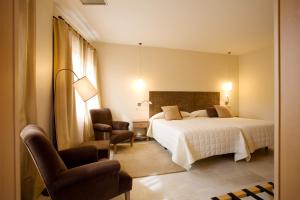 Posteľ alebo postele v izbe v ubytovaní Hotel La Vida Spa