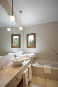 Kúpeľňa v ubytovaní Hotel La Vida Spa