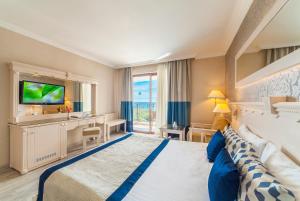 Postel nebo postele na pokoji v ubytování Hotel Turan Prince - Ex Sentido Turan Prince