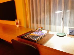 TV a/nebo společenská místnost v ubytování Kaohsiung Chateau de Chine Hotel