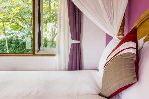 Postel nebo postele na pokoji v ubytování Bali Lover