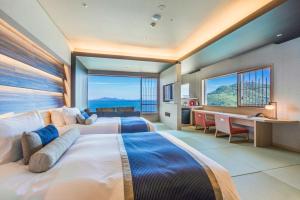 Postel nebo postele na pokoji v ubytování Hotel Ofutei