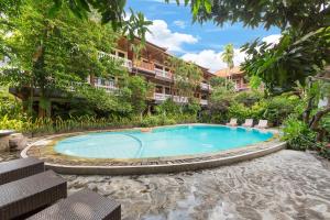 Bazén v ubytování Simpang Inn Hotel nebo v jeho okolí