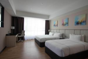Higher Hotel客房内的一张或多张床位