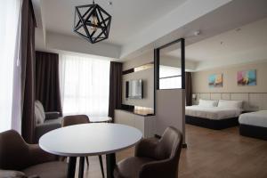 Higher Hotel客房内的一张或多张床位