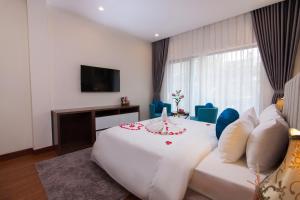 TV a/nebo společenská místnost v ubytování Hanoi Hanvet Hotel