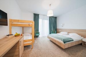 Ένα ή περισσότερα κρεβάτια σε δωμάτιο στο Hotel DADA Termal