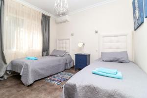Łóżko lub łóżka w pokoju w obiekcie Villa Vita in Elviria