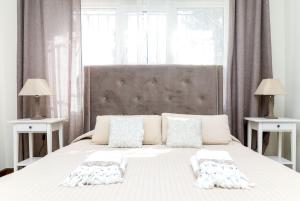 Łóżko lub łóżka w pokoju w obiekcie Villa Vita in Elviria