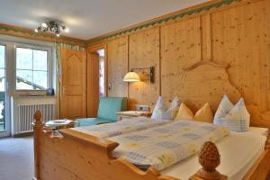 Postel nebo postele na pokoji v ubytování Gästehaus - Apart Braito