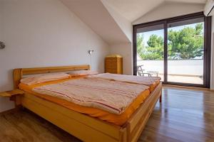 Posteľ alebo postele v izbe v ubytovaní Villa Ana