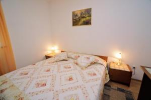 Posteľ alebo postele v izbe v ubytovaní Apartment Cirila